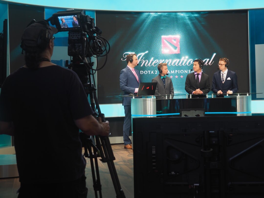News anchor reading from teleprompter in TV studio