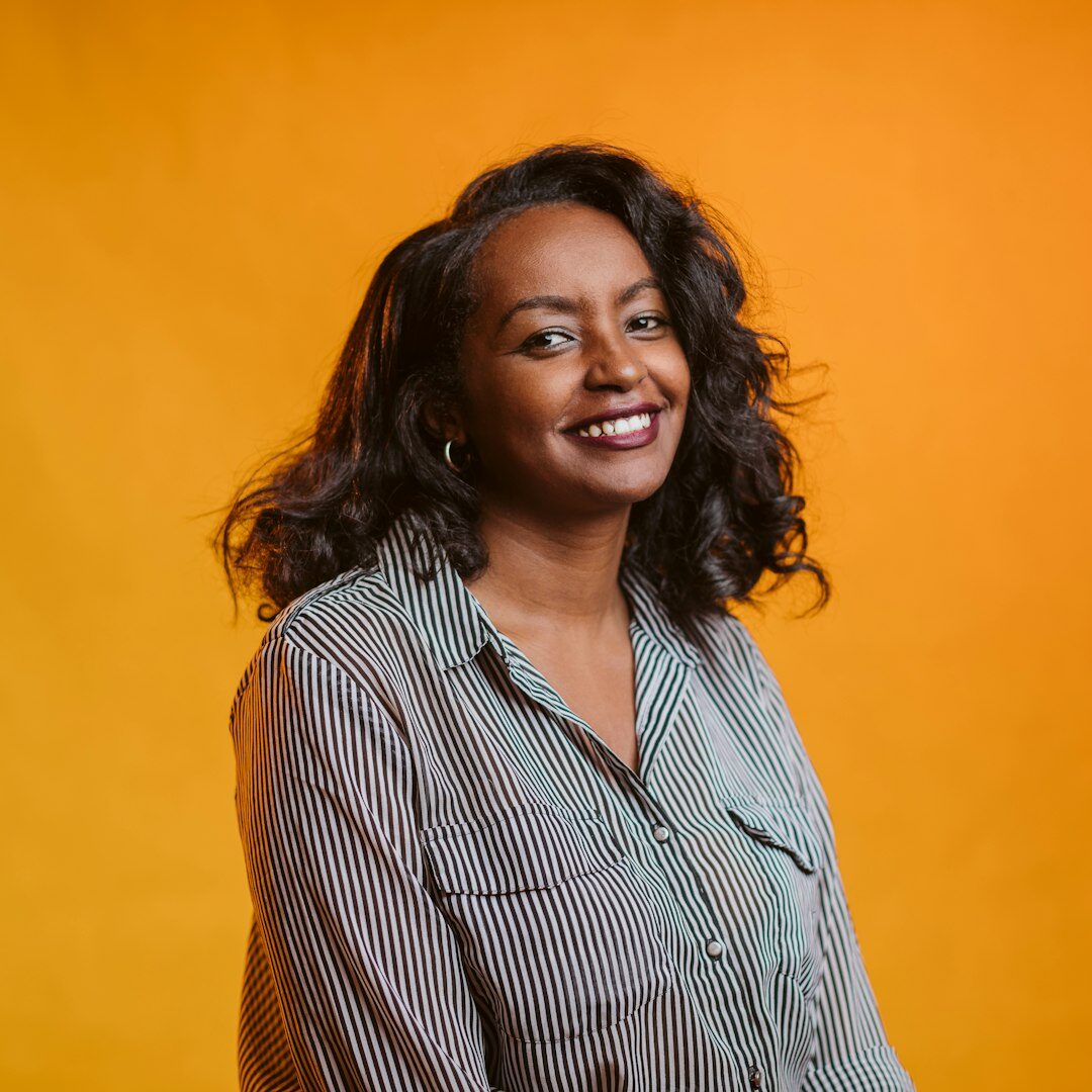 Happy young woman student smiling